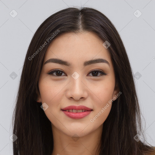 Joyful asian young-adult female with long  brown hair and brown eyes