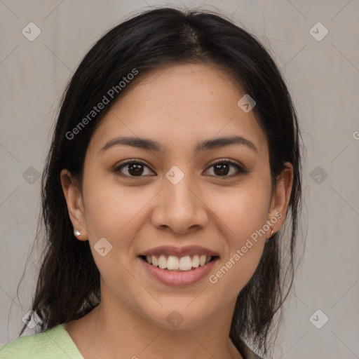 Joyful latino young-adult female with medium  brown hair and brown eyes