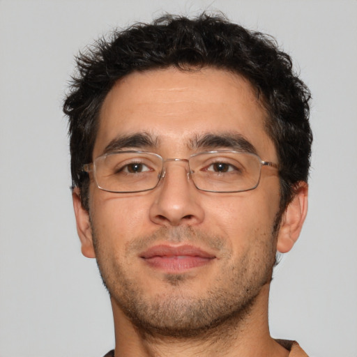 Neutral white adult male with short  brown hair and brown eyes