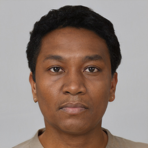 Neutral black young-adult male with short  black hair and brown eyes