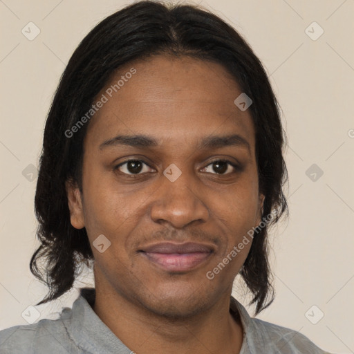 Joyful black young-adult female with medium  brown hair and brown eyes
