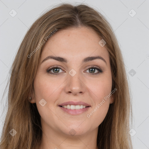 Joyful white young-adult female with long  brown hair and grey eyes