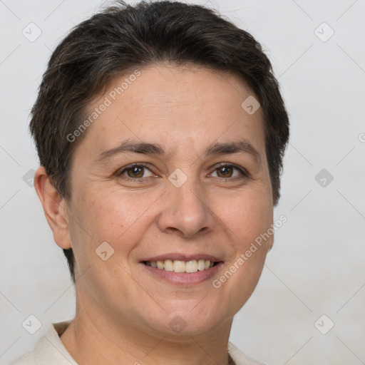 Joyful white adult female with short  brown hair and brown eyes