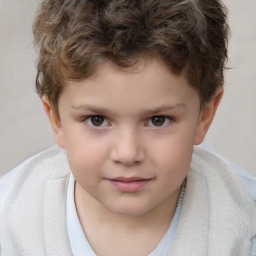 Joyful white child male with short  brown hair and brown eyes