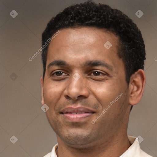 Joyful latino adult male with short  black hair and brown eyes