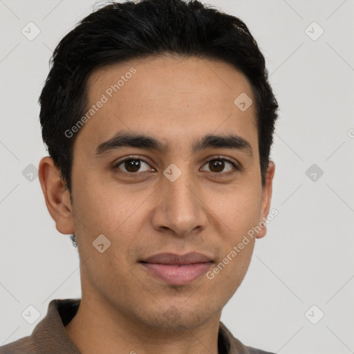 Joyful latino young-adult male with short  brown hair and brown eyes