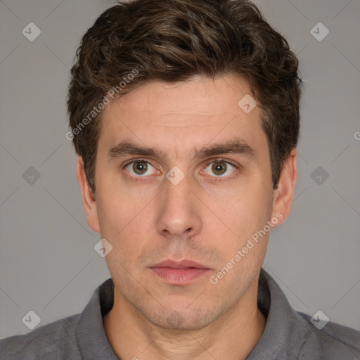 Neutral white young-adult male with short  brown hair and brown eyes