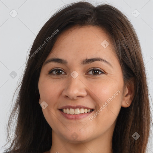 Joyful white young-adult female with long  brown hair and brown eyes