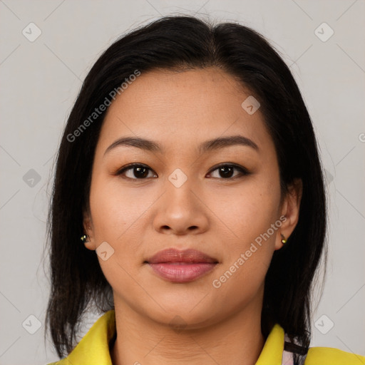 Joyful asian young-adult female with medium  brown hair and brown eyes