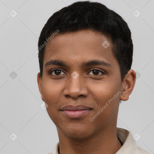 Joyful black young-adult male with short  brown hair and brown eyes