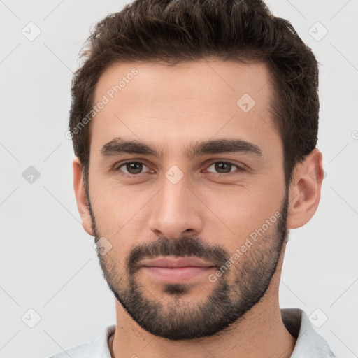 Neutral white young-adult male with short  brown hair and brown eyes