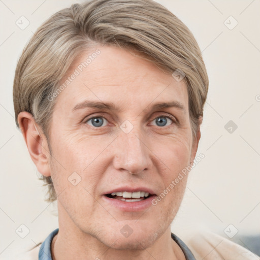 Joyful white adult male with short  brown hair and grey eyes