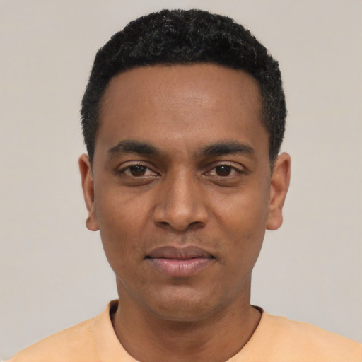 Neutral black young-adult male with short  black hair and brown eyes