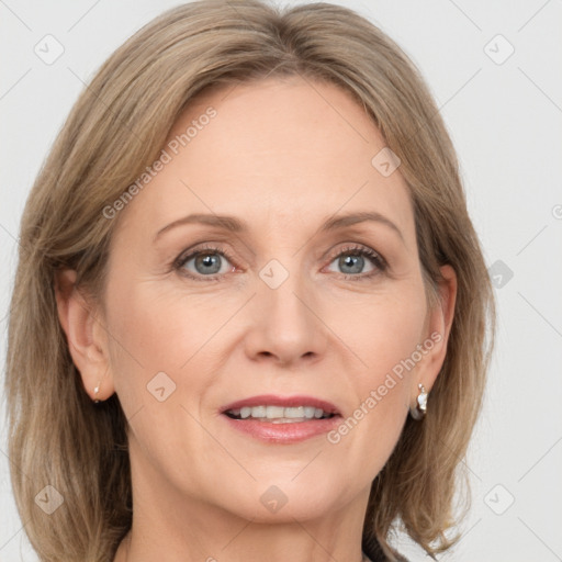 Joyful white adult female with medium  brown hair and grey eyes