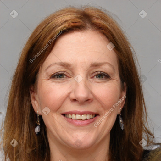 Joyful white adult female with long  brown hair and brown eyes