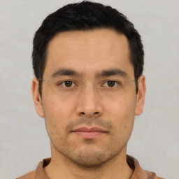 Neutral asian young-adult male with short  black hair and brown eyes