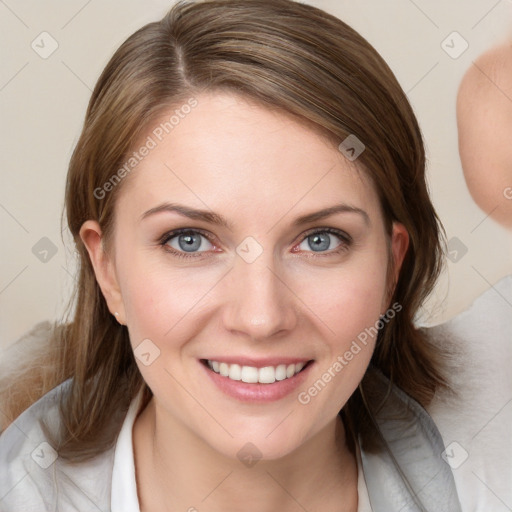 Joyful white young-adult female with medium  brown hair and blue eyes