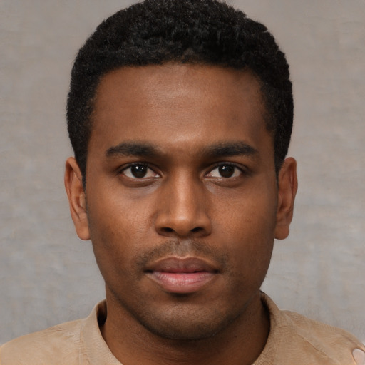 Neutral black young-adult male with short  brown hair and brown eyes