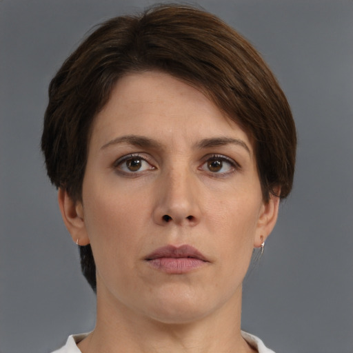 Neutral white young-adult female with short  brown hair and brown eyes