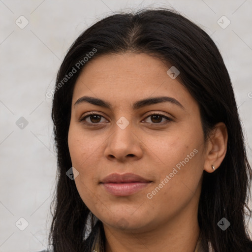 Joyful latino young-adult female with long  brown hair and brown eyes