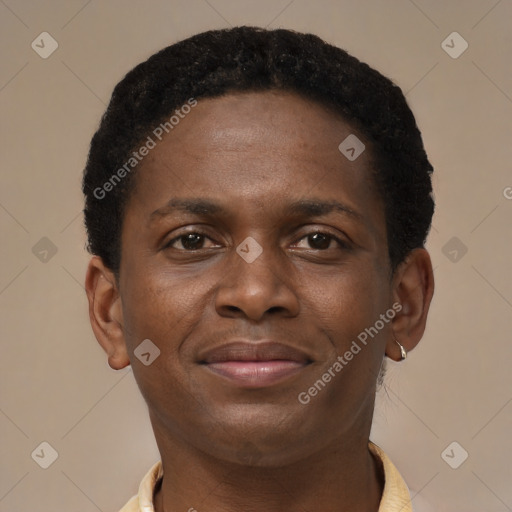 Joyful black young-adult male with short  brown hair and brown eyes