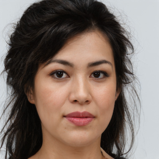 Joyful asian young-adult female with medium  brown hair and brown eyes