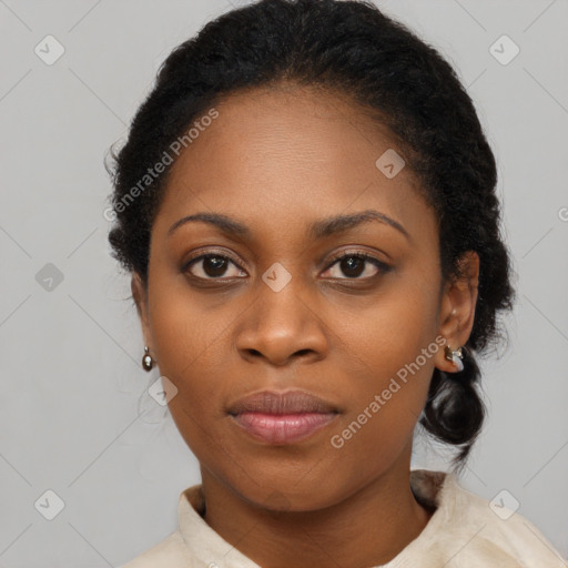 Joyful black young-adult female with medium  black hair and brown eyes