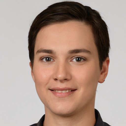 Joyful white young-adult female with short  brown hair and brown eyes