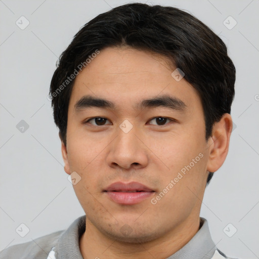 Neutral asian young-adult male with short  black hair and brown eyes