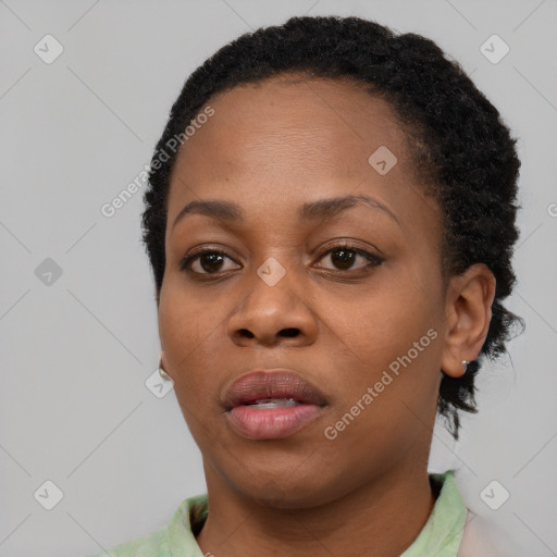 Neutral black young-adult female with short  black hair and brown eyes