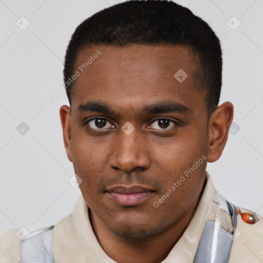 Neutral latino young-adult male with short  brown hair and brown eyes