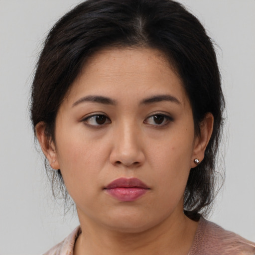 Neutral asian young-adult female with medium  brown hair and brown eyes