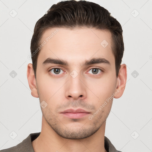 Neutral white young-adult male with short  brown hair and brown eyes