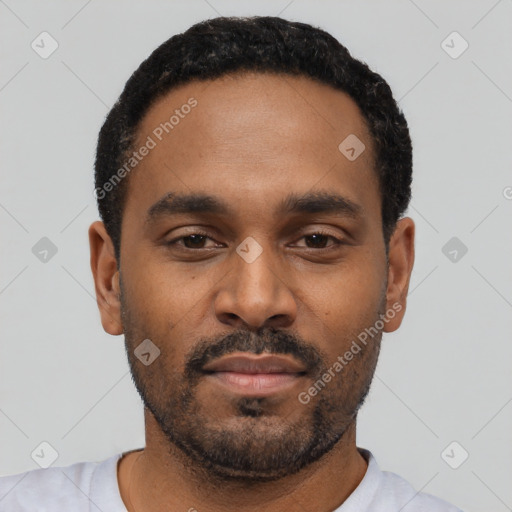 Neutral latino young-adult male with short  black hair and brown eyes
