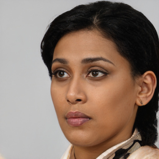 Neutral asian young-adult female with medium  black hair and brown eyes