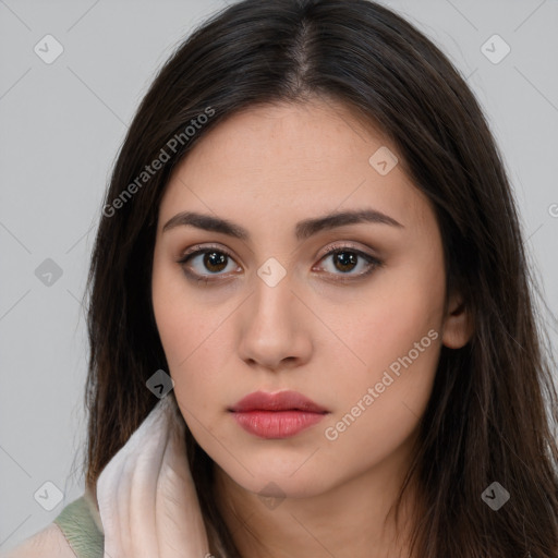 Neutral white young-adult female with long  brown hair and brown eyes