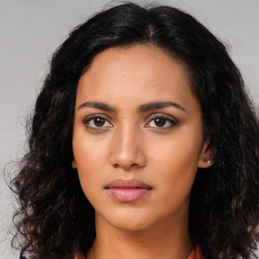 Neutral latino young-adult female with long  black hair and brown eyes
