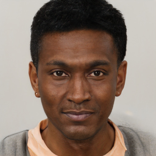 Neutral black young-adult male with short  black hair and brown eyes