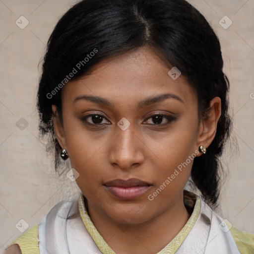 Joyful latino young-adult female with medium  brown hair and brown eyes