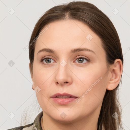 Neutral white young-adult female with long  brown hair and grey eyes