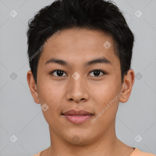 Joyful asian young-adult male with short  brown hair and brown eyes