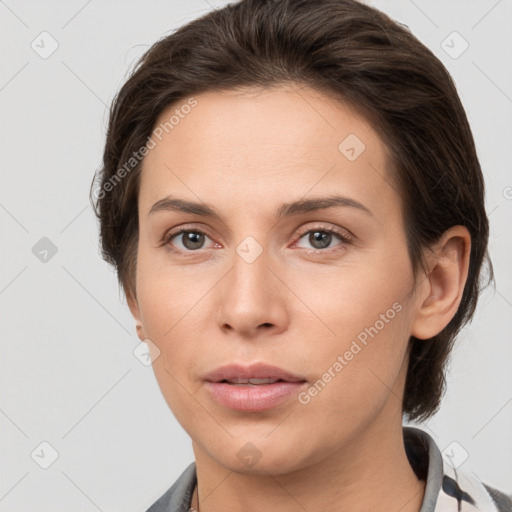 Neutral white young-adult female with medium  brown hair and brown eyes