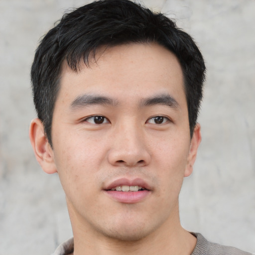 Neutral white young-adult male with short  black hair and brown eyes