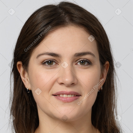 Joyful white young-adult female with long  brown hair and grey eyes