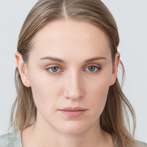 Neutral white young-adult female with medium  brown hair and blue eyes