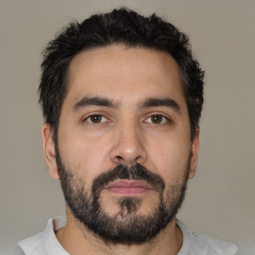Neutral white young-adult male with short  black hair and brown eyes