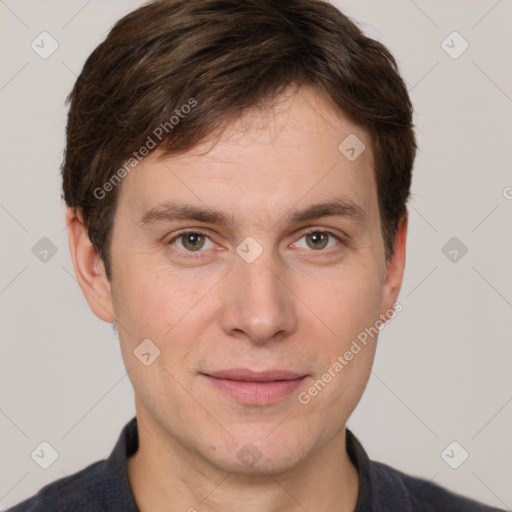 Joyful white adult male with short  brown hair and grey eyes