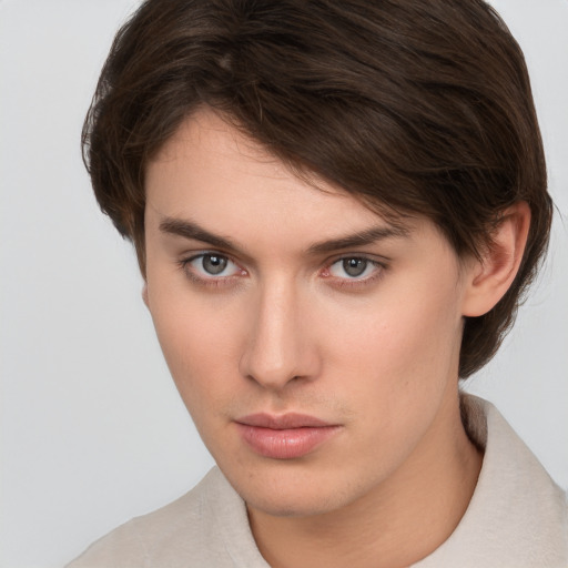 Neutral white young-adult female with short  brown hair and brown eyes