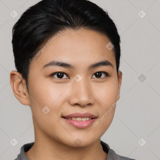 Joyful asian young-adult female with short  brown hair and brown eyes