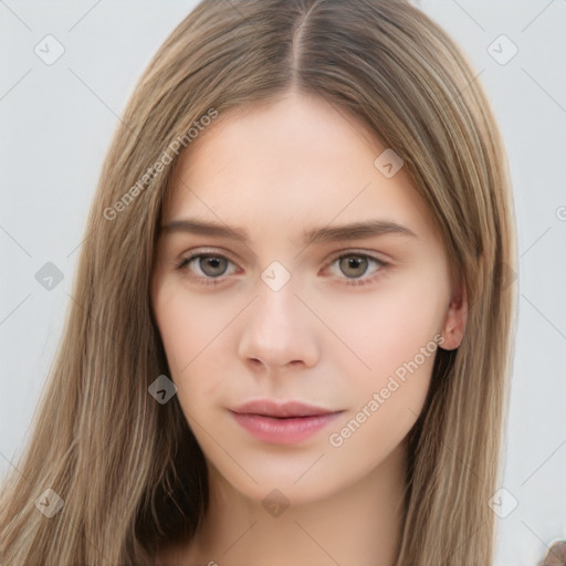 Neutral white young-adult female with long  brown hair and brown eyes